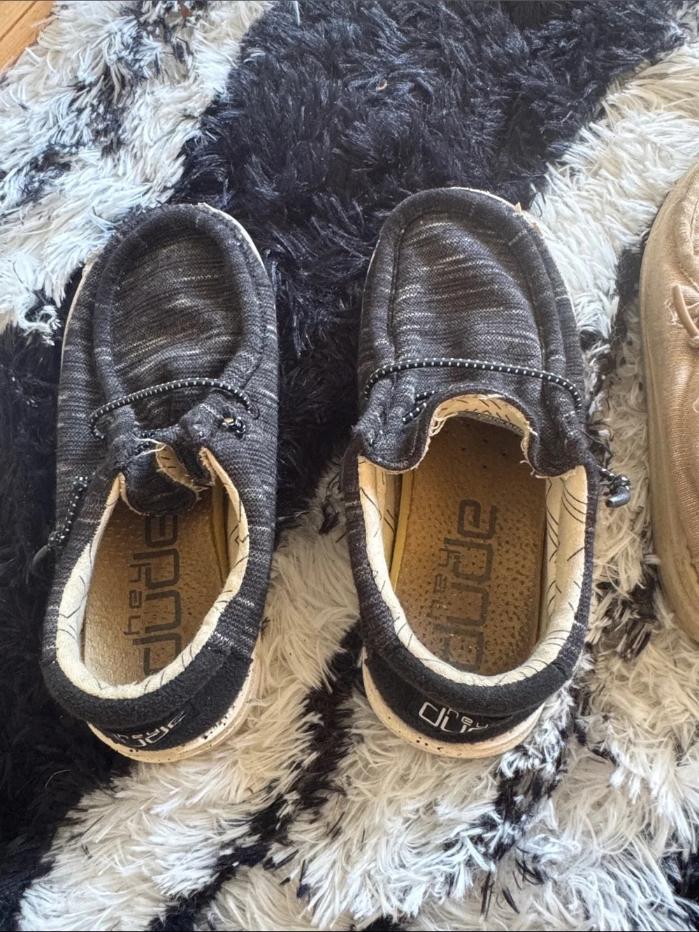 Hey Dude Kids Slip-On Moccasins in Black and Tan